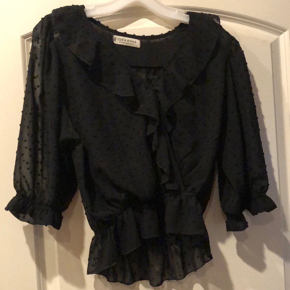 Black sheer ruffled cropped top. Never worn.